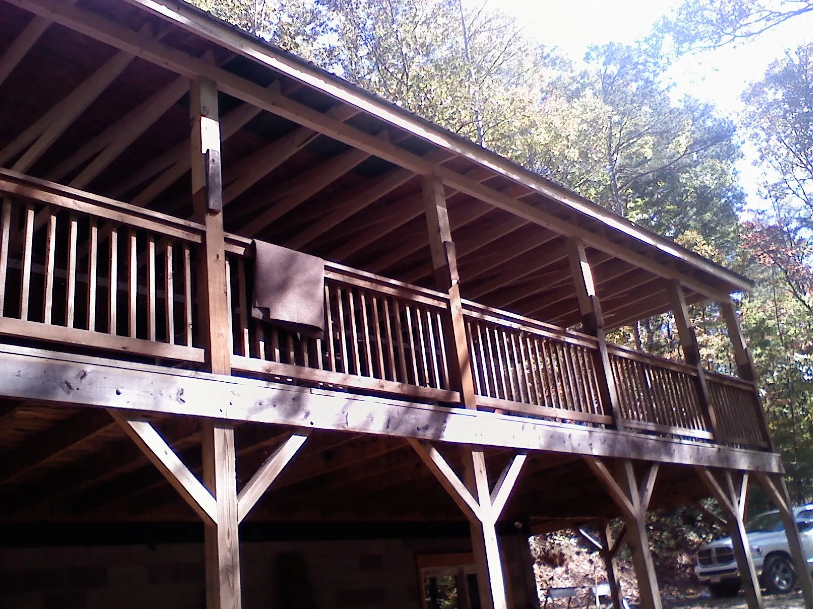 Timber framing under a new elevated porch and deck — Roof Leak Repair in March Air Reserve Base by Roofing Brothers
